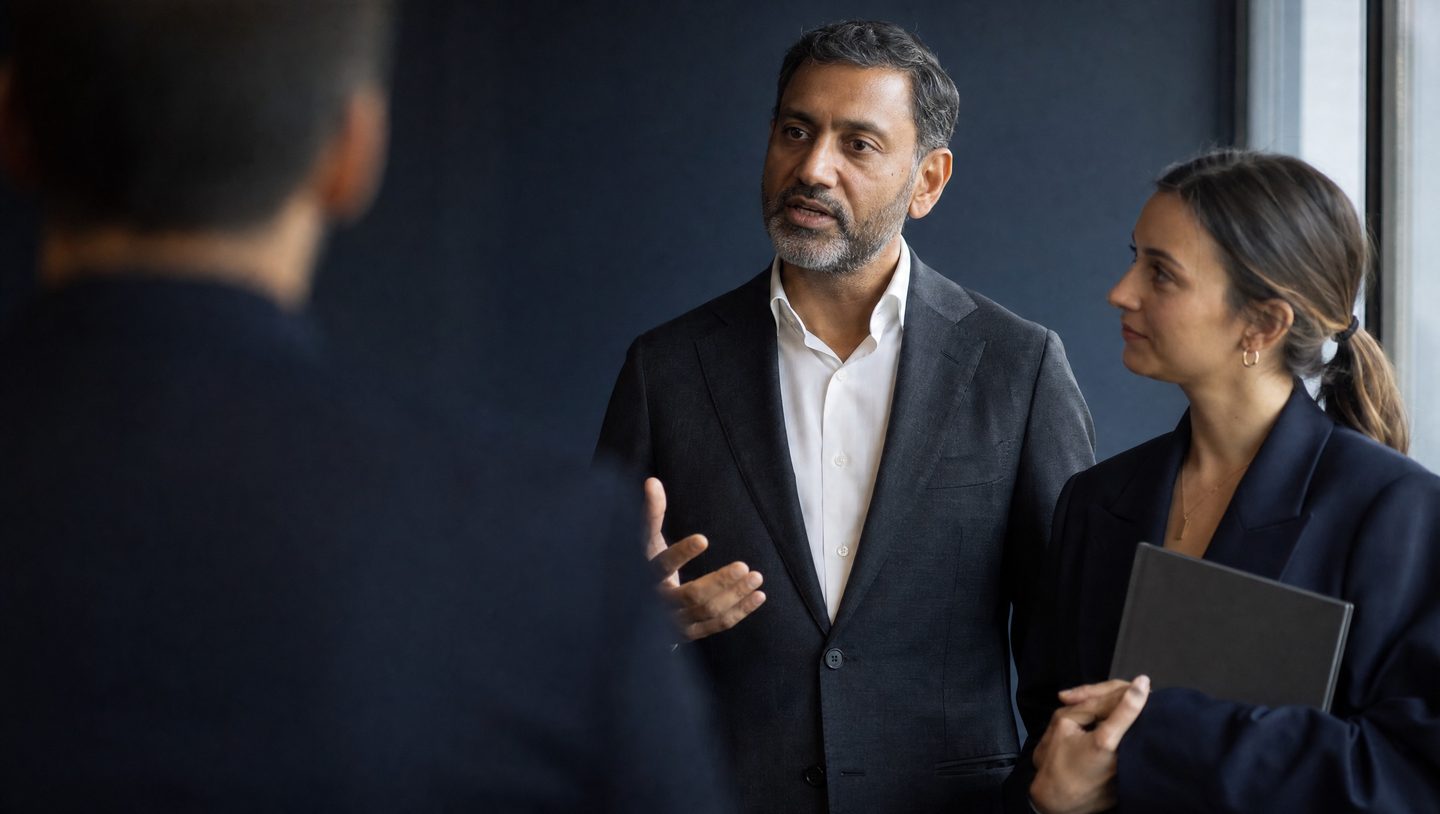 Two advisers in conversation in a Melbourne office